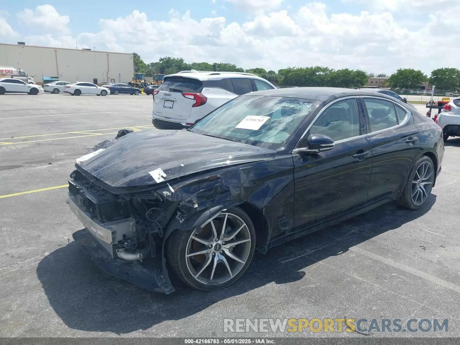 2 Photograph of a damaged car KMTG34TA3PU129713 GENESIS G70 2023