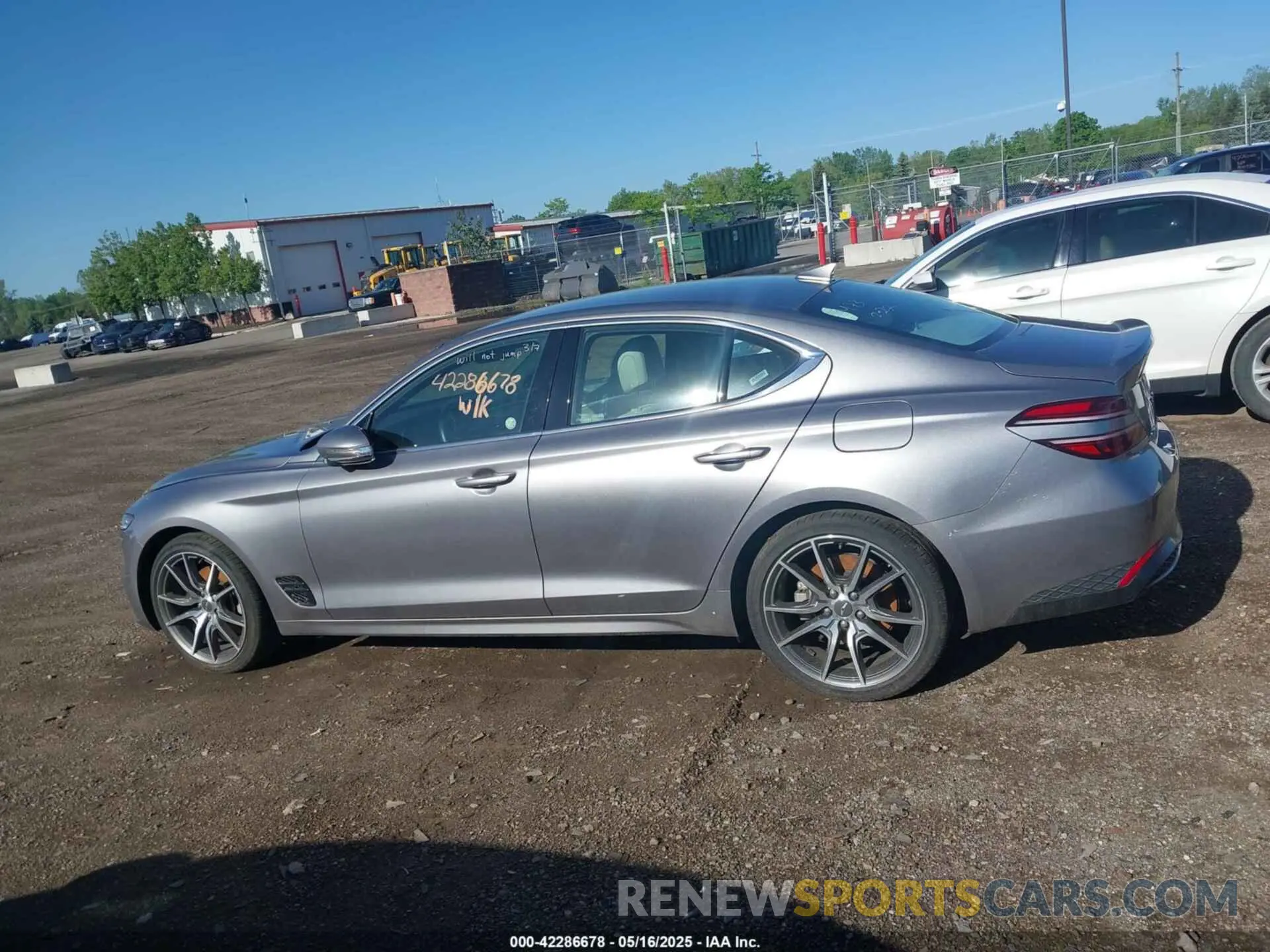 14 Photograph of a damaged car KMTG34TA3PU131624 GENESIS G70 2023