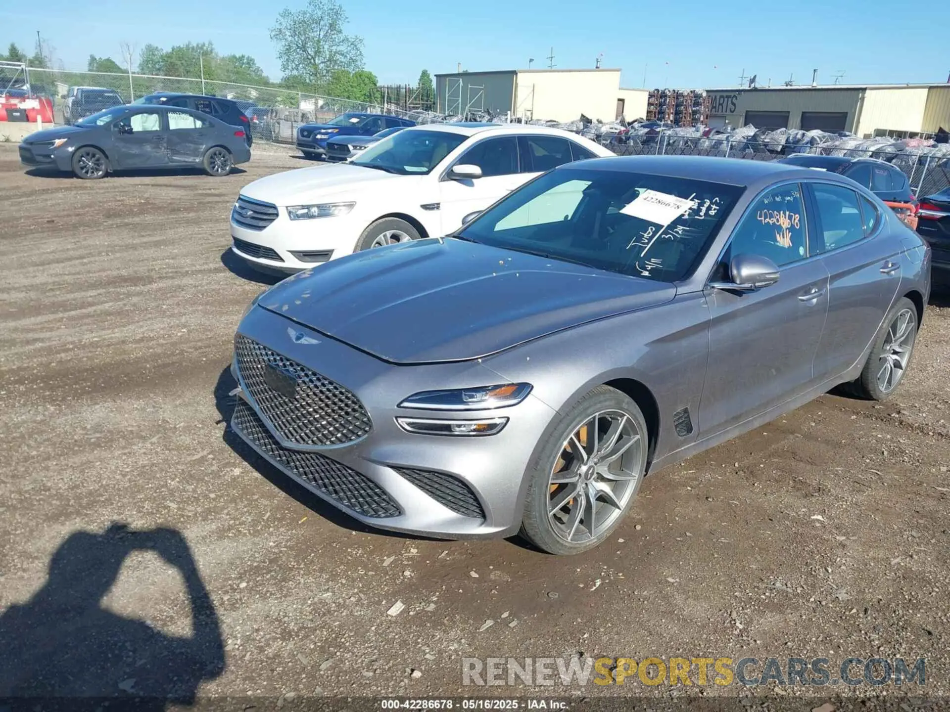 2 Photograph of a damaged car KMTG34TA3PU131624 GENESIS G70 2023
