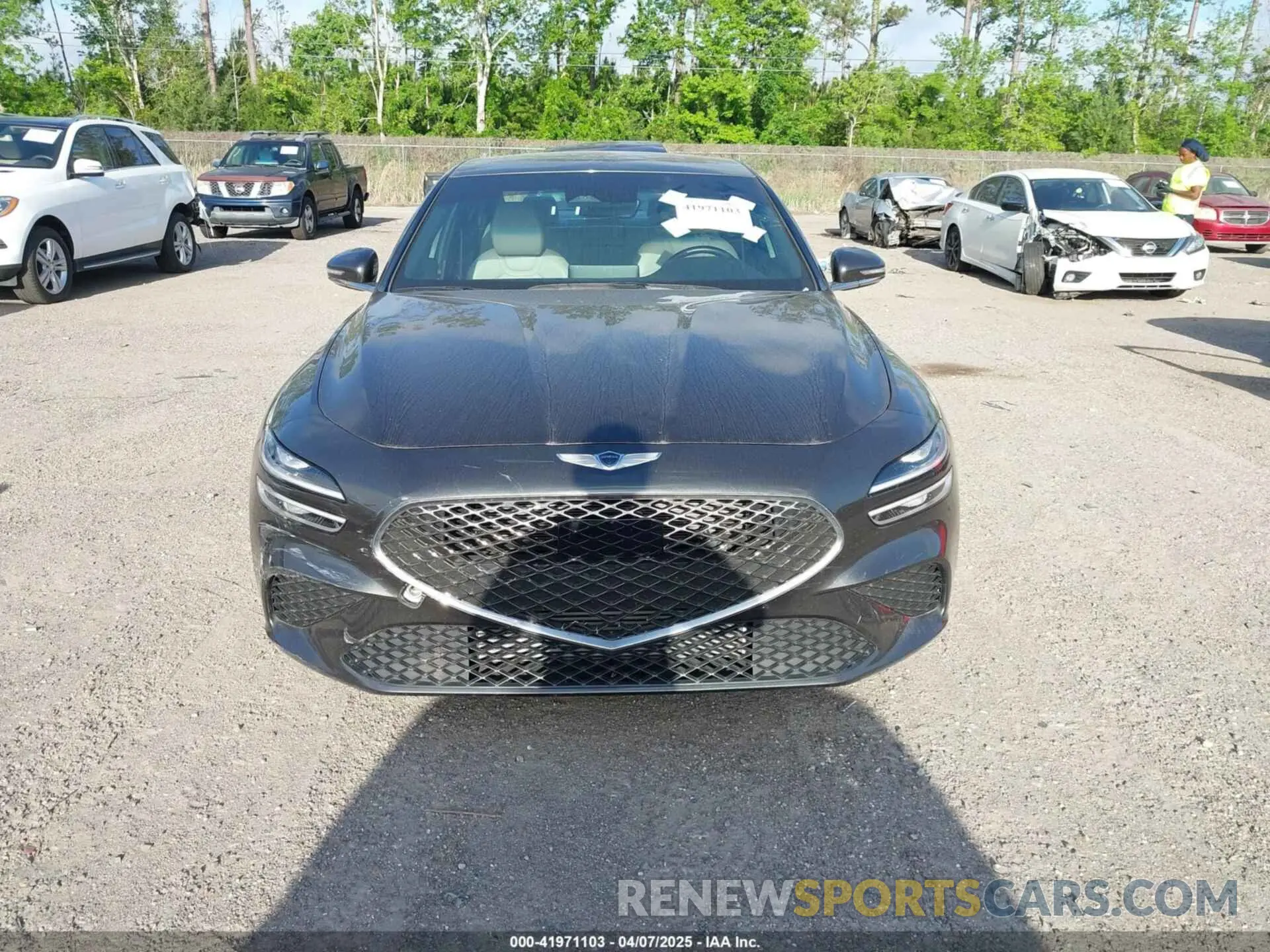 12 Photograph of a damaged car KMTG34TA4PU126965 GENESIS G70 2023