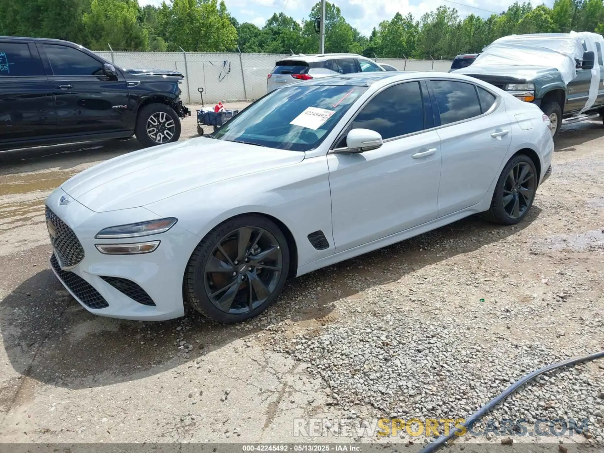2 Photograph of a damaged car KMTG34TA6PU111805 GENESIS G70 2023