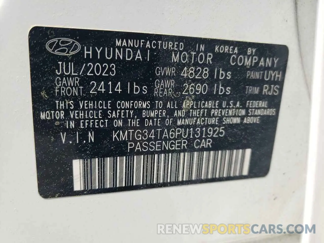 14 Photograph of a damaged car KMTG34TA6PU131925 GENESIS G70 2023