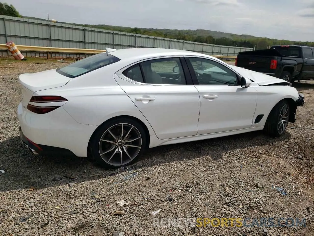 3 Photograph of a damaged car KMTG34TA6PU131925 GENESIS G70 2023