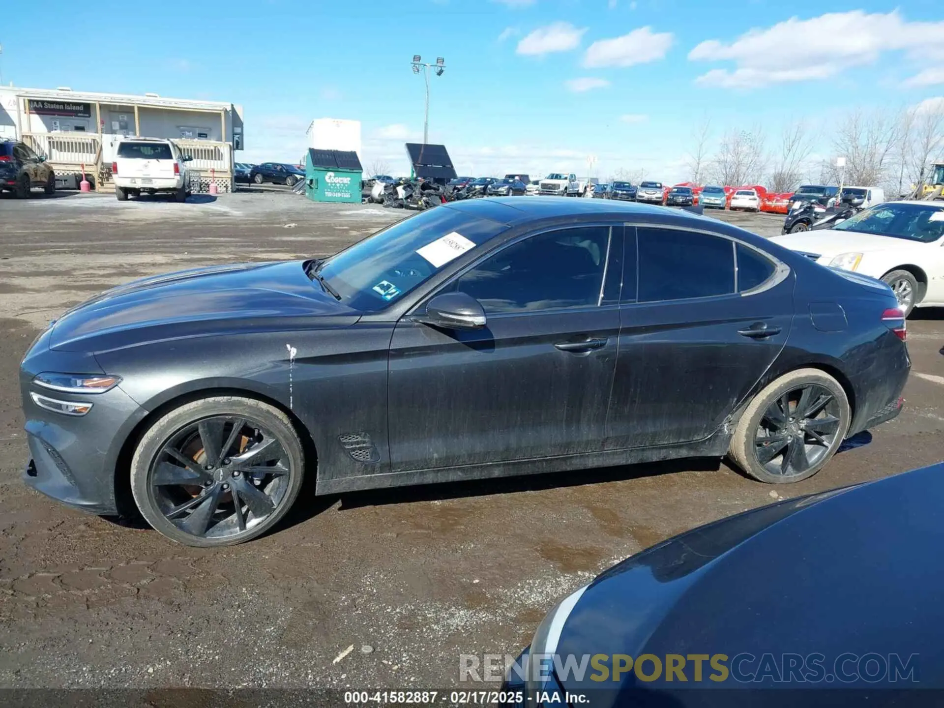14 Photograph of a damaged car KMTG34TA9PU109174 GENESIS G70 2023