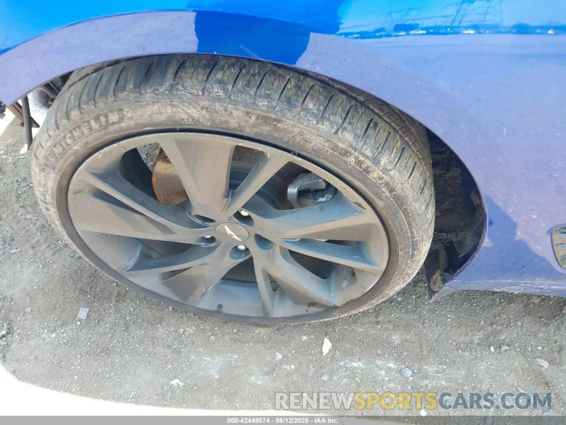 12 Photograph of a damaged car KMTG34TAXPU112892 GENESIS G70 2023