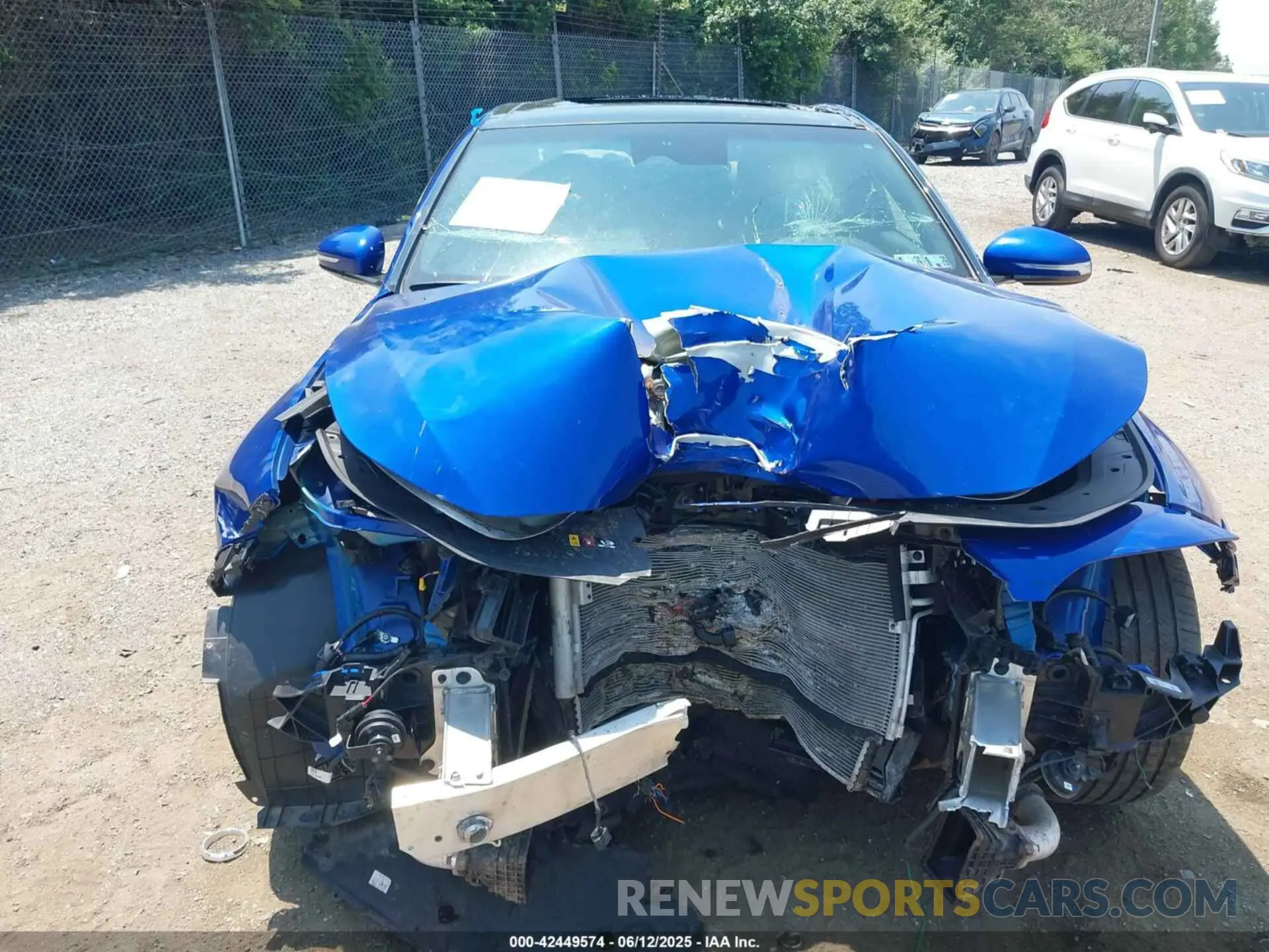 13 Photograph of a damaged car KMTG34TAXPU112892 GENESIS G70 2023