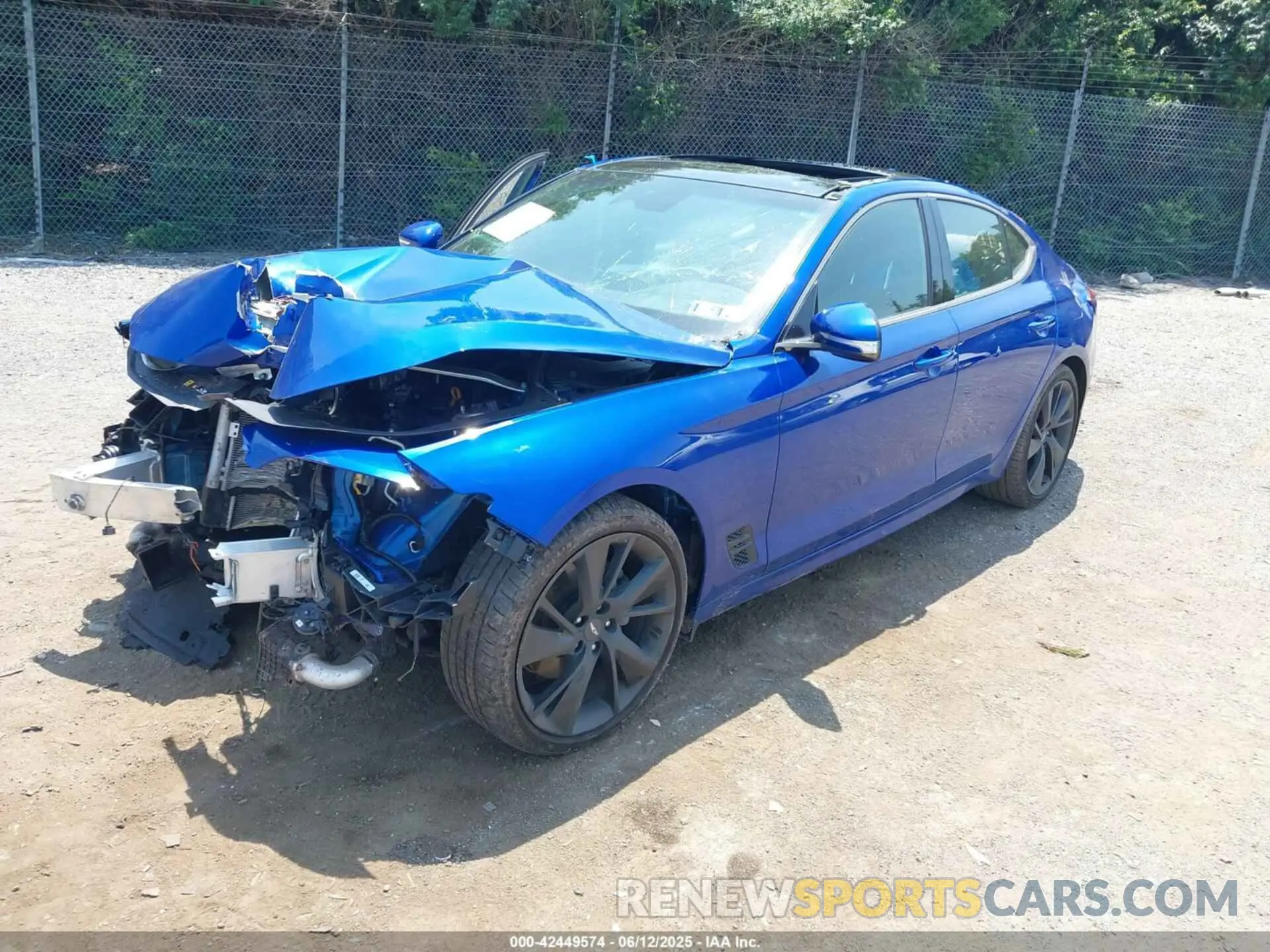 2 Photograph of a damaged car KMTG34TAXPU112892 GENESIS G70 2023