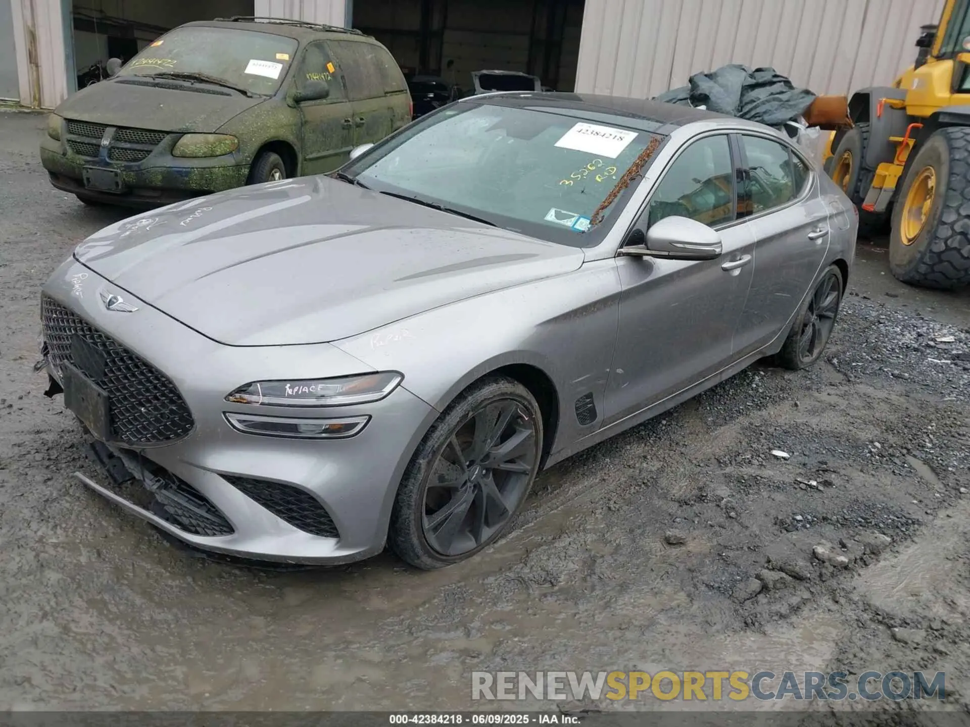 2 Photograph of a damaged car KMTG34TAXPU115811 GENESIS G70 2023