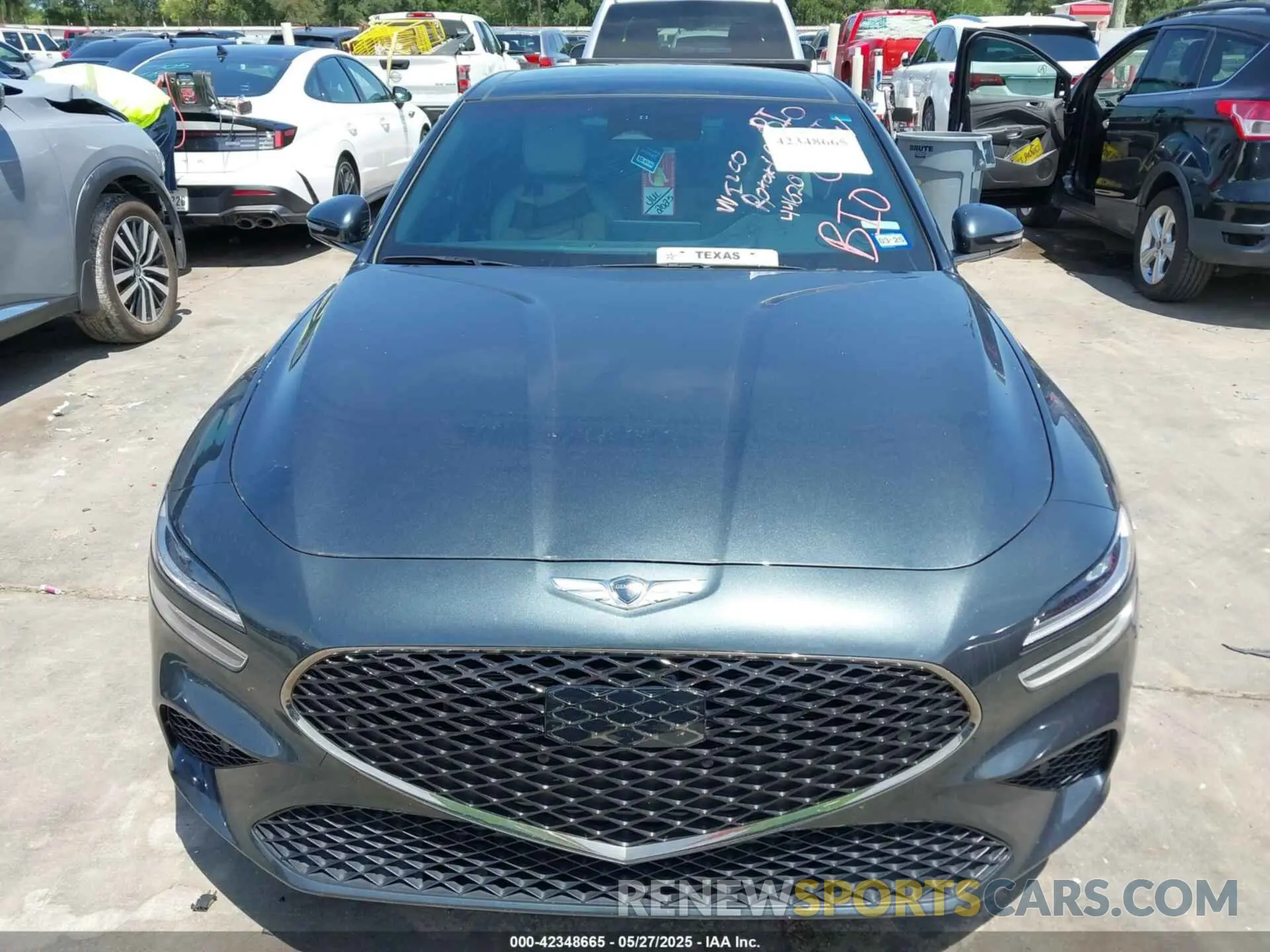 12 Photograph of a damaged car KMTG54TE0PU119668 GENESIS G70 2023