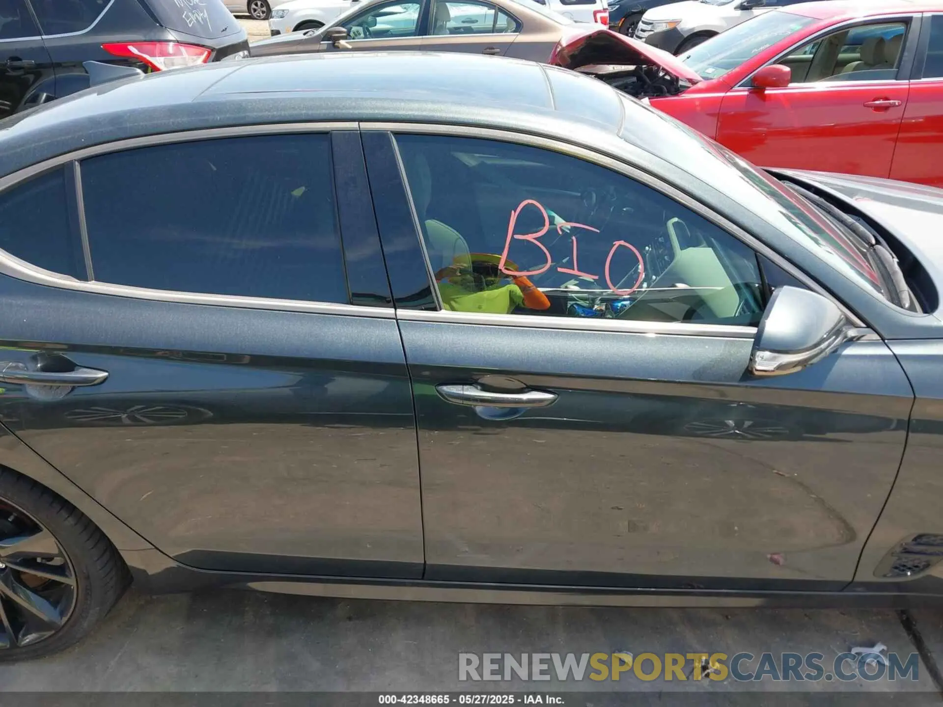 13 Photograph of a damaged car KMTG54TE0PU119668 GENESIS G70 2023