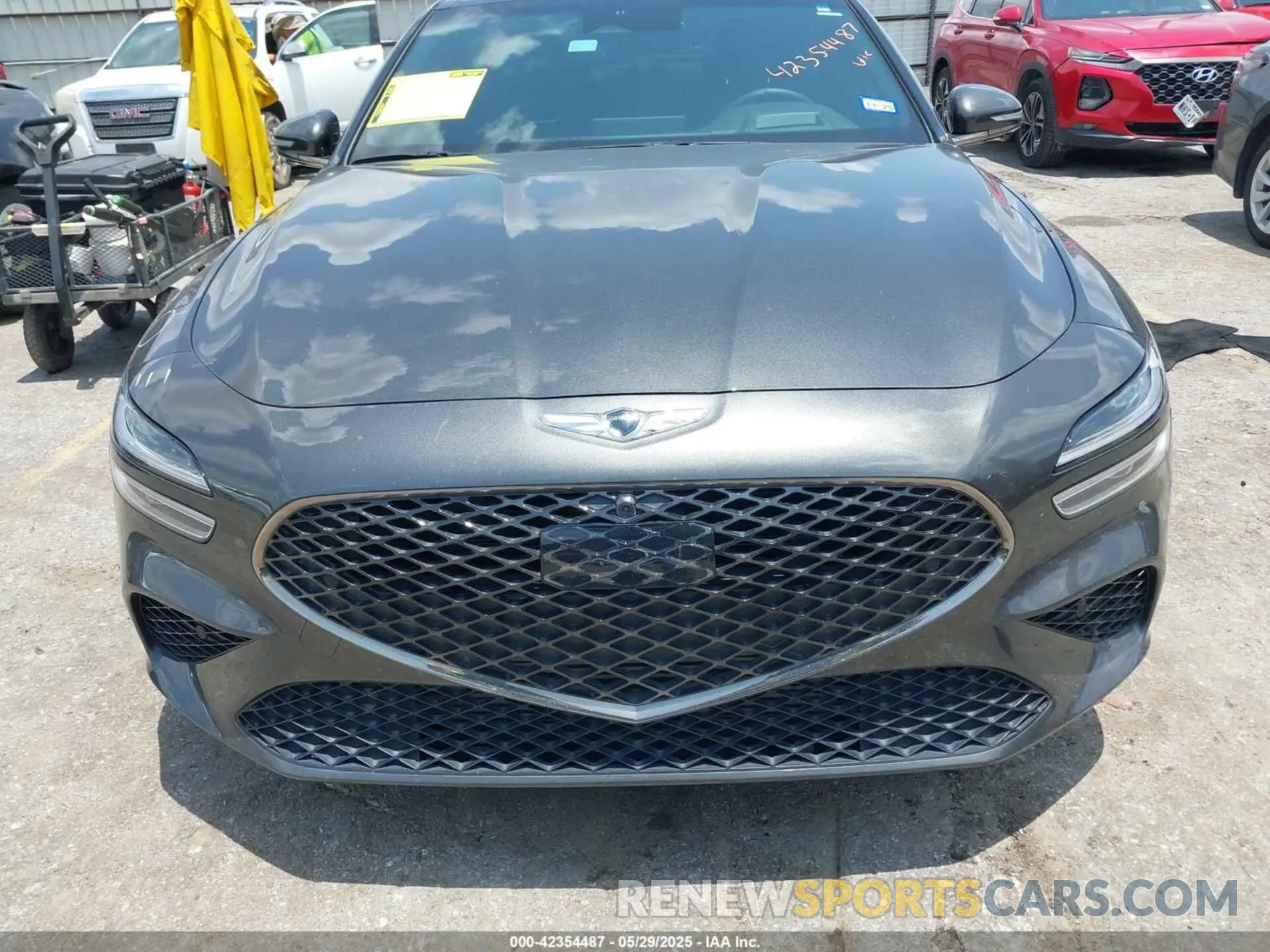 13 Photograph of a damaged car KMTG54TE0PU135594 GENESIS G70 2023