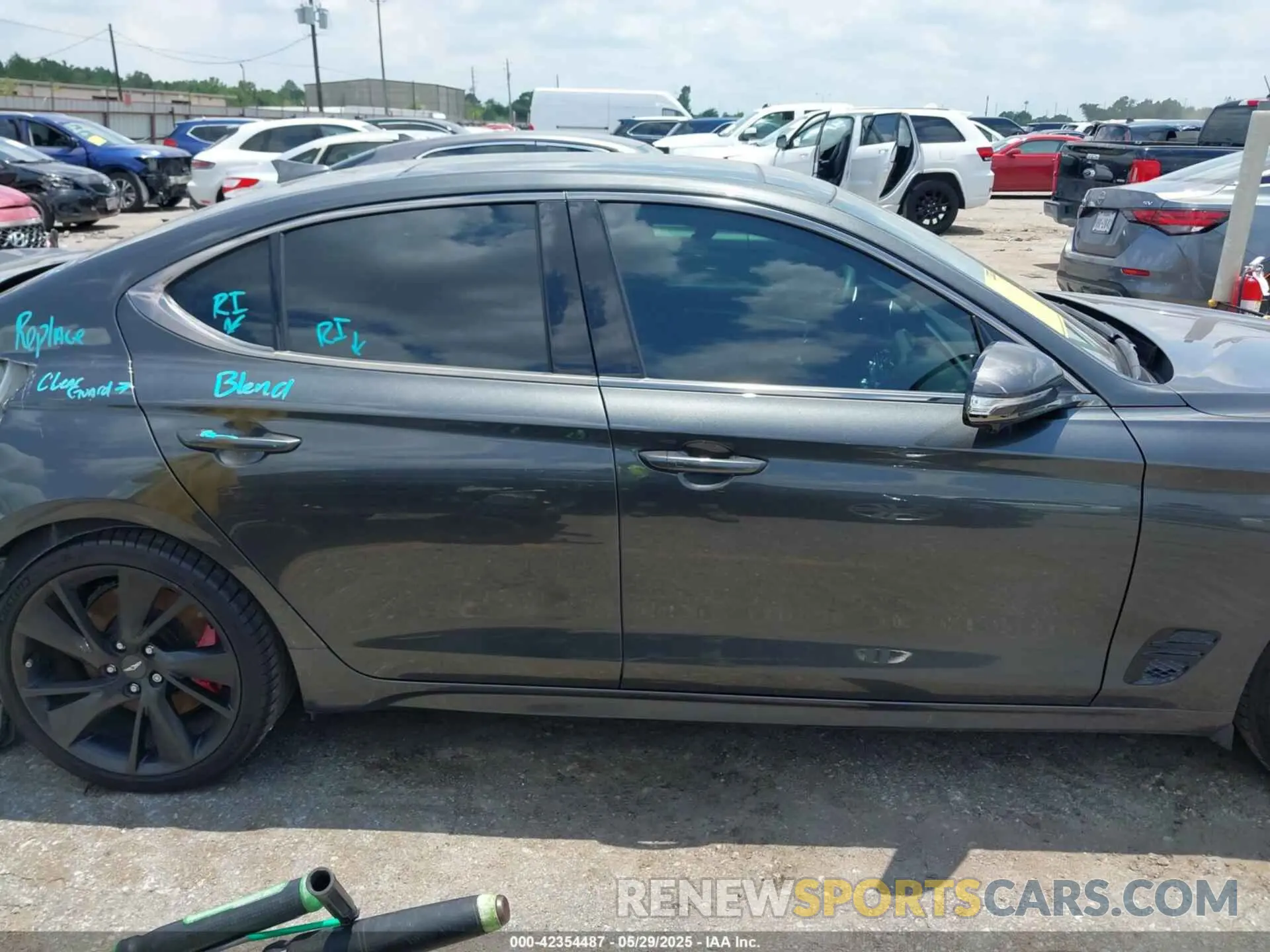 14 Photograph of a damaged car KMTG54TE0PU135594 GENESIS G70 2023