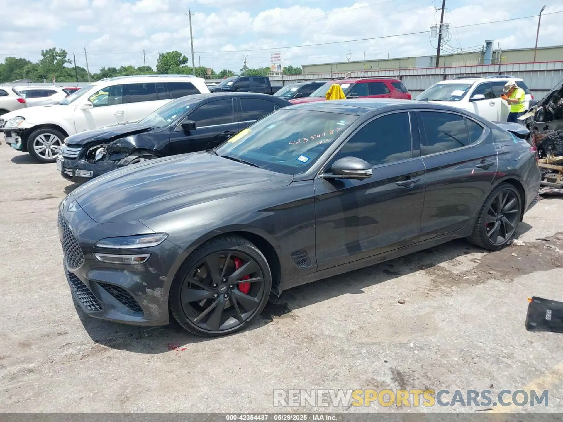 2 Photograph of a damaged car KMTG54TE0PU135594 GENESIS G70 2023