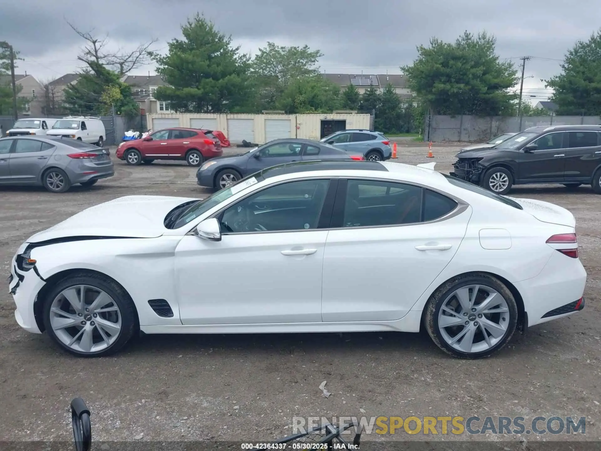 14 Photograph of a damaged car KMTG54TE5PU135106 GENESIS G70 2023