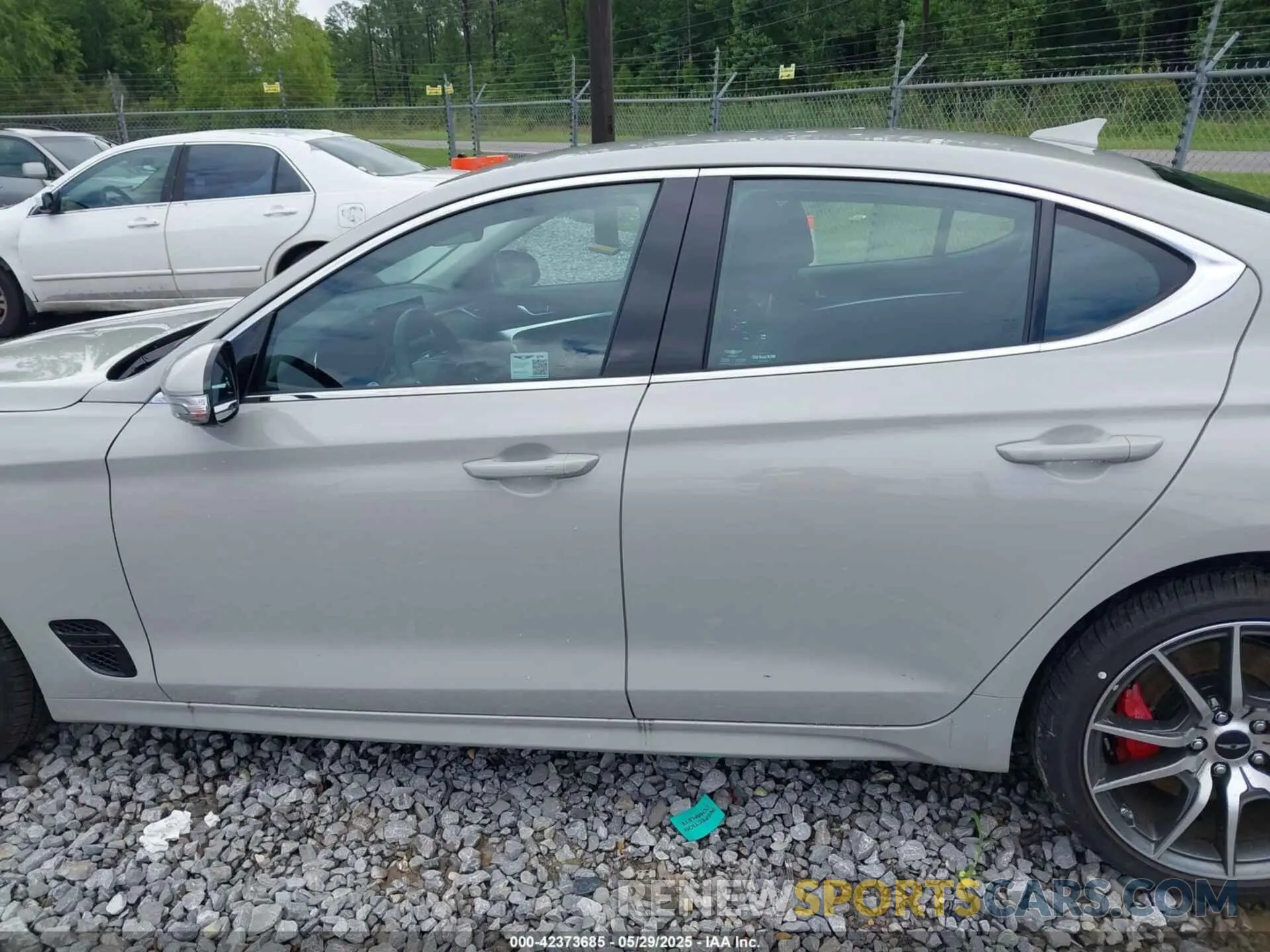 14 Photograph of a damaged car KMTG34SC2SU155702 GENESIS G70 2025