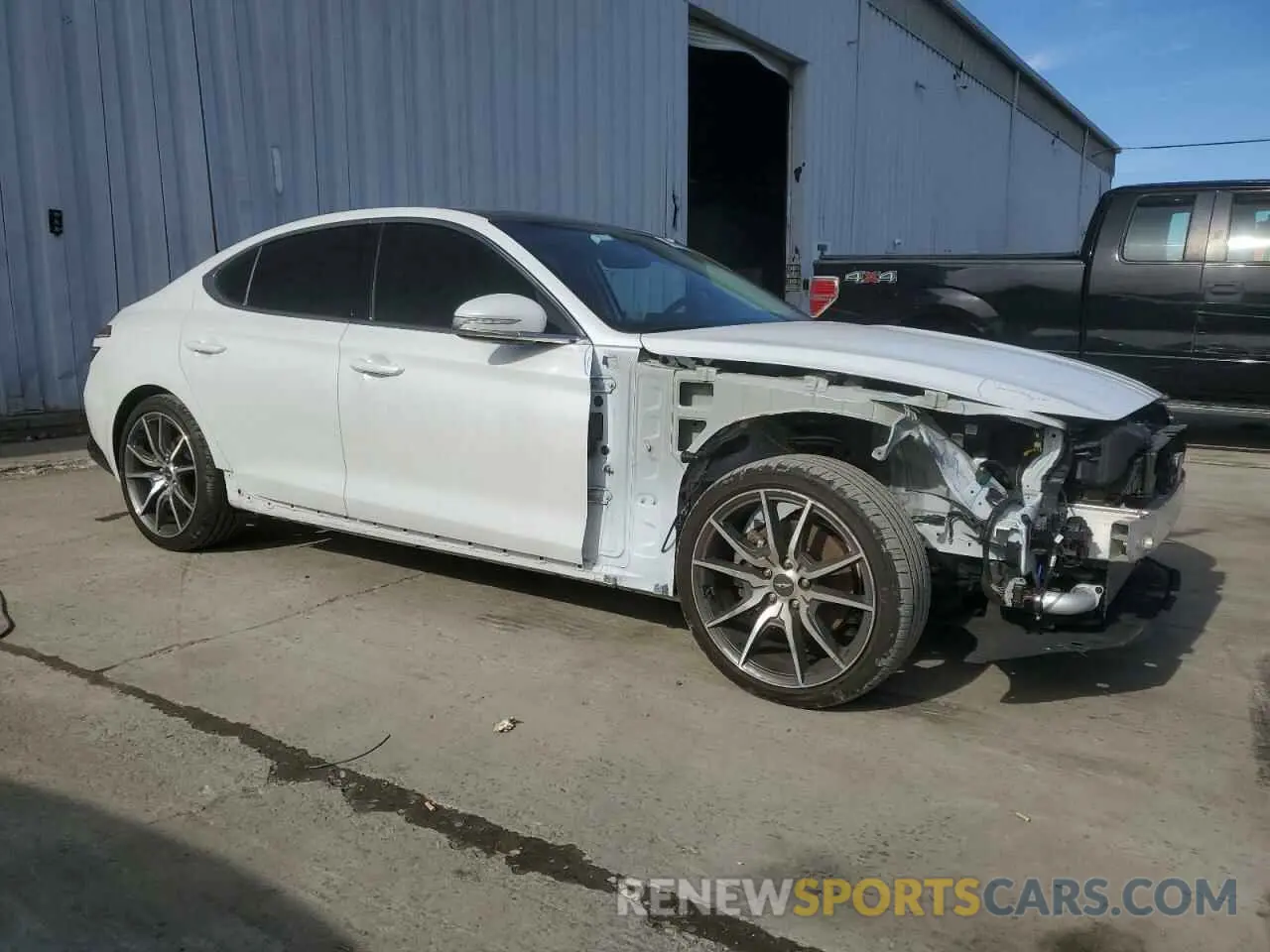 4 Photograph of a damaged car KMTG34TA1NU103382 GENESIS G70 BASE 2022