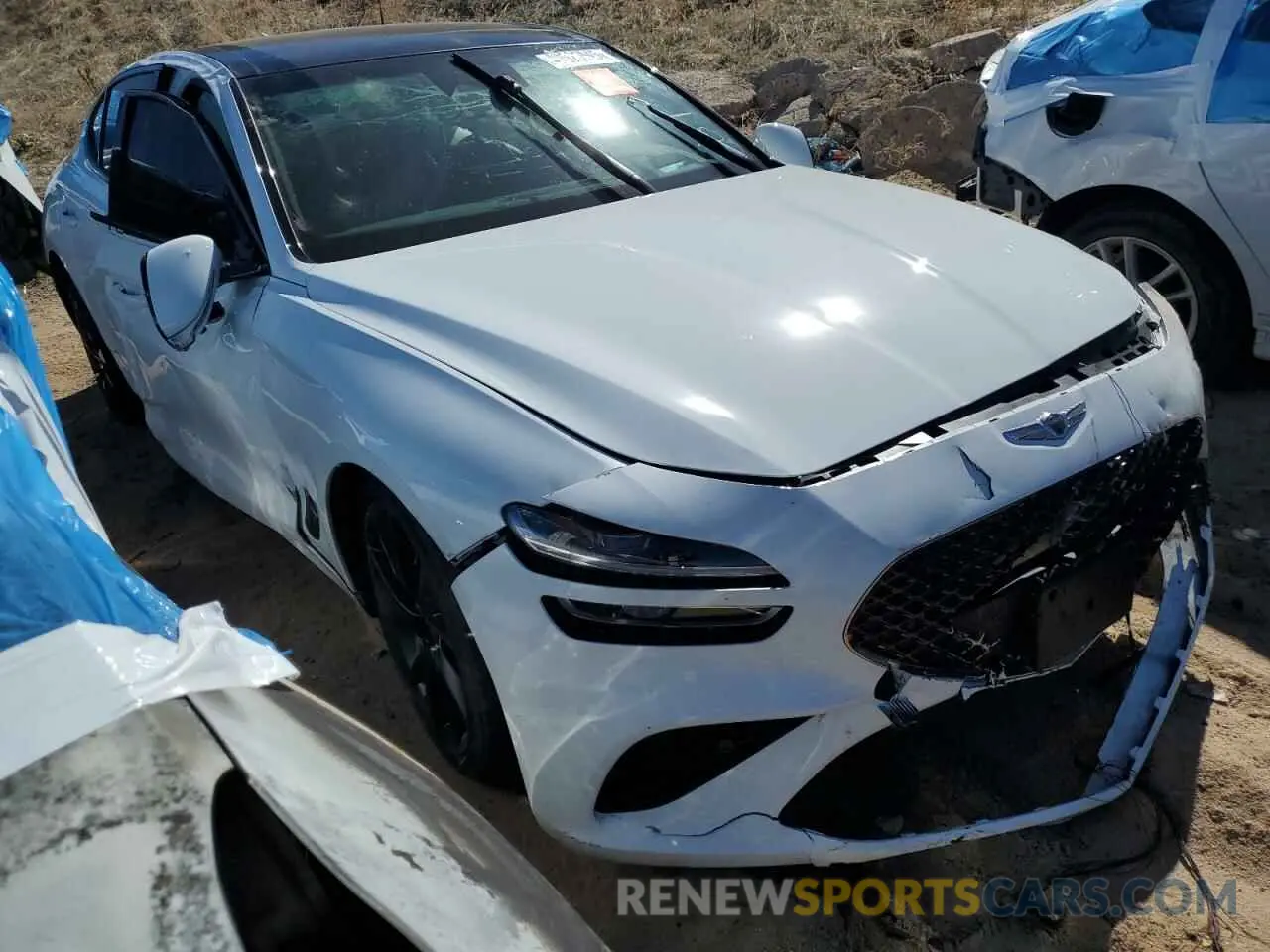 4 Photograph of a damaged car KMTG54TE3NU102585 GENESIS G70 BASE 2022