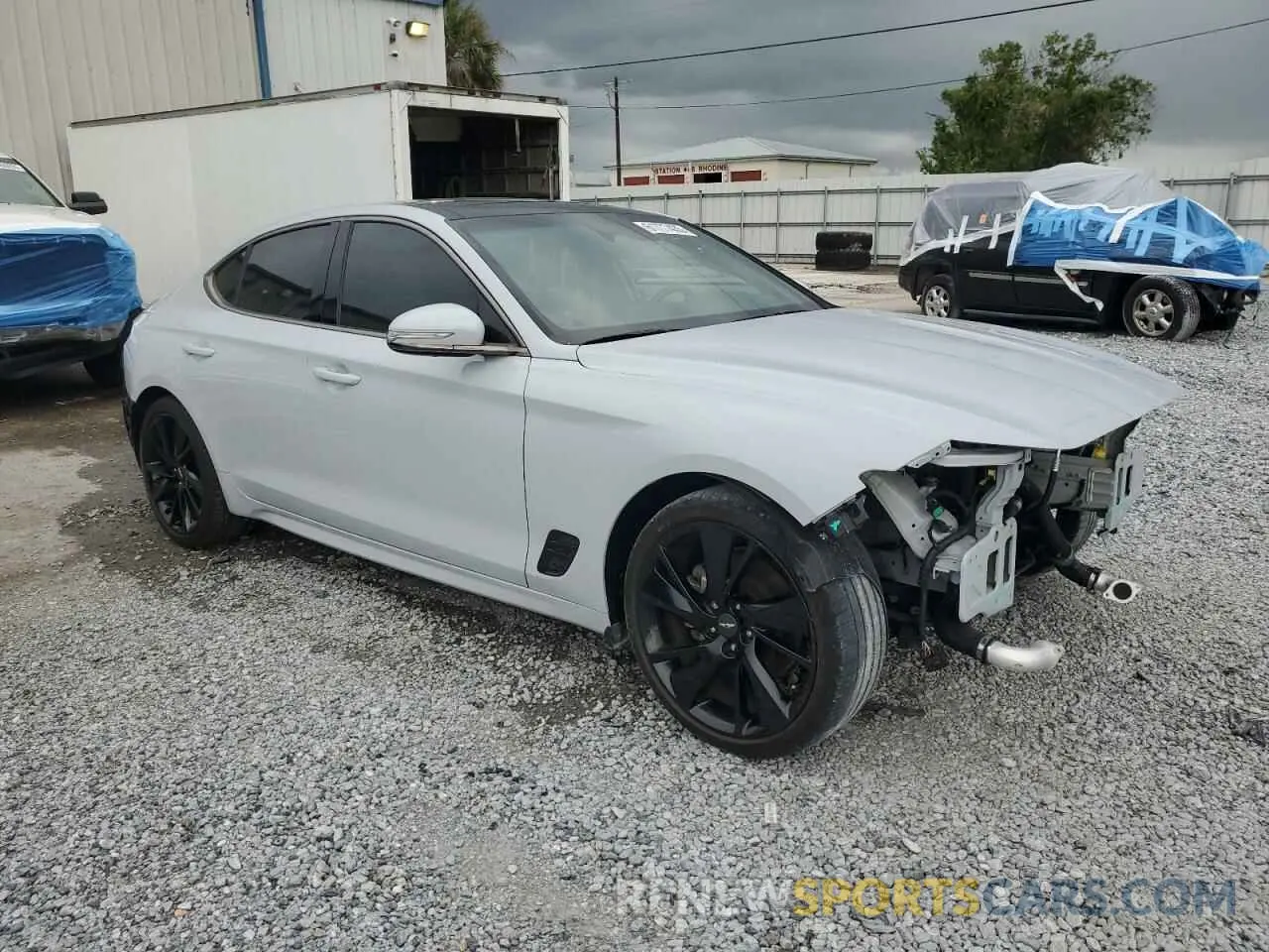 4 Photograph of a damaged car KMTG34TA3PU114905 GENESIS G70 BASE 2023
