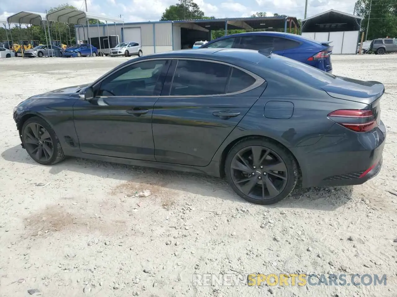 2 Photograph of a damaged car KMTG34TA4PU120566 GENESIS G70 BASE 2023
