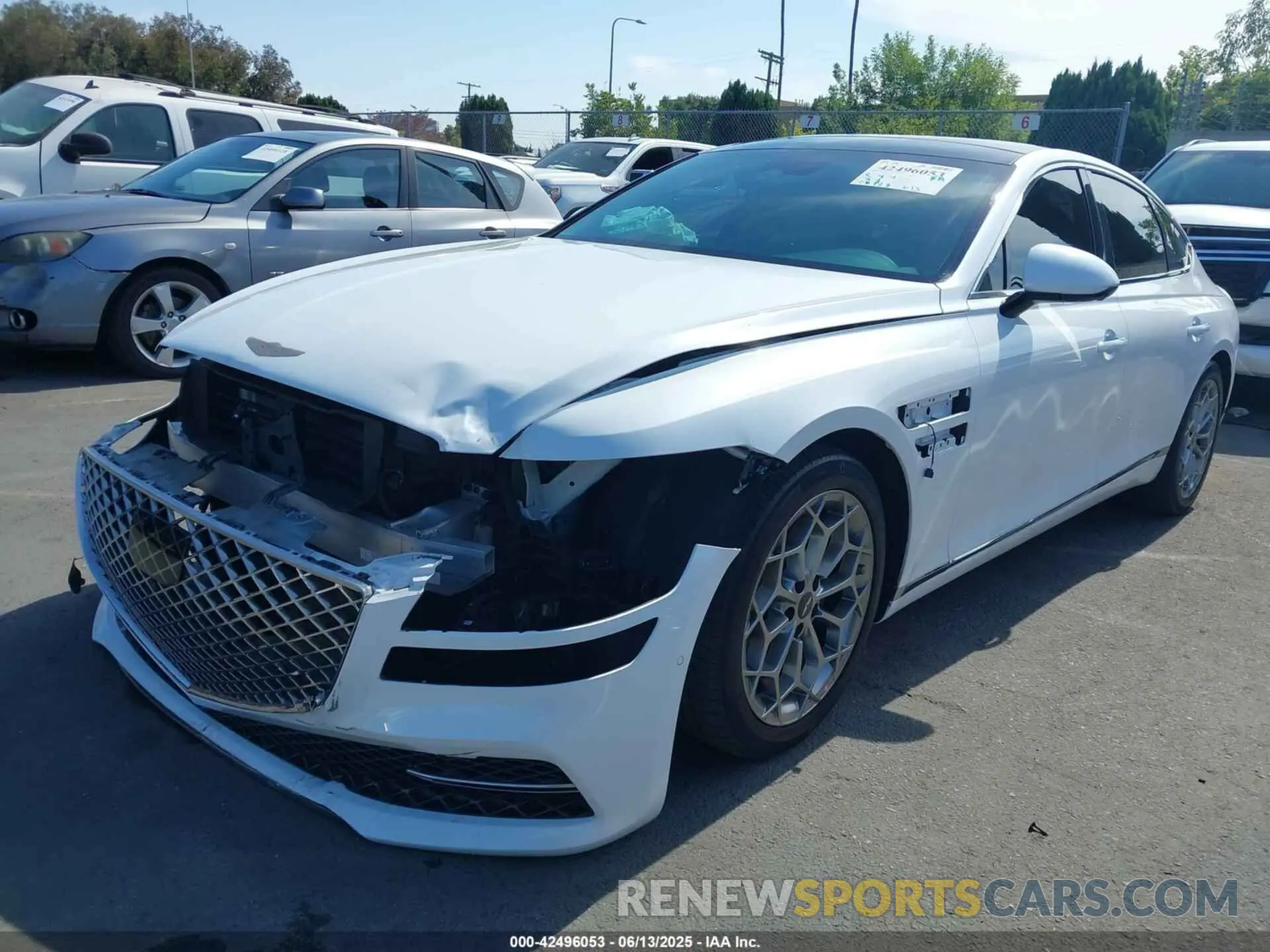 2 Photograph of a damaged car KMTGB4SC9NU137558 GENESIS G80 2022