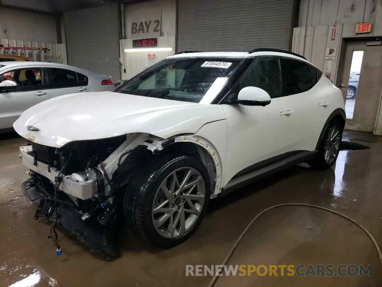 1 Photograph of a damaged car KMUKCDSC0RU020119 GENESIS GV60 ADVAN 2024