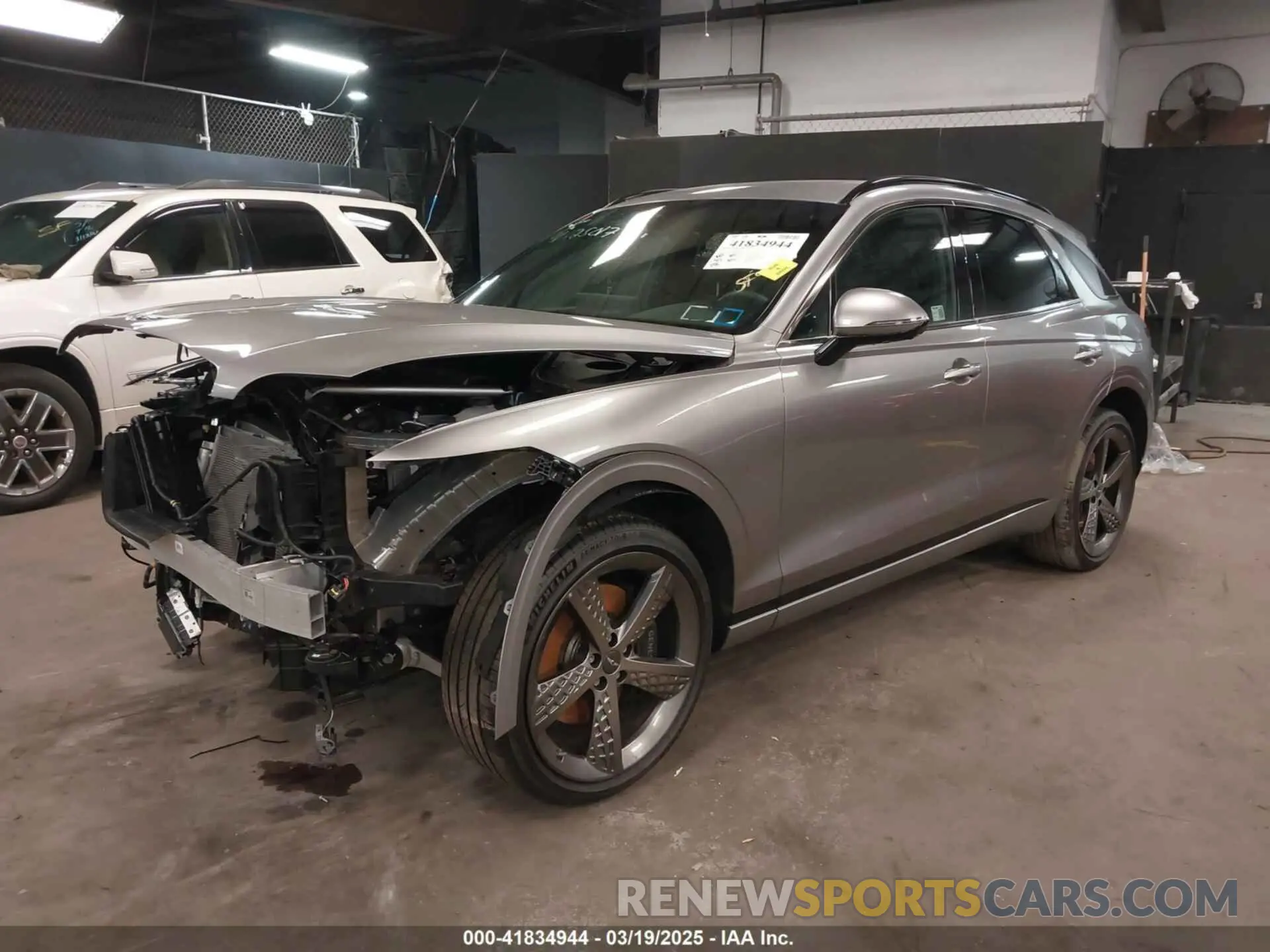 2 Photograph of a damaged car KMUMADTB0PU140200 GENESIS GV70 2023