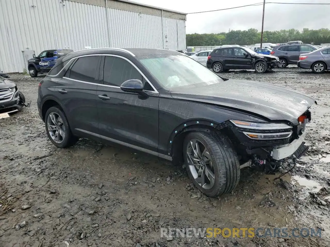 4 Photograph of a damaged car 5NMMCET14PH000281 GENESIS GV70 BASE 2023