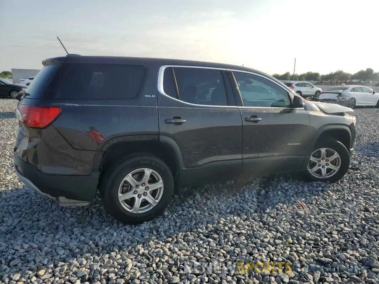 3 Photograph of a damaged car 1GKKNKLA7KZ110637 GMC ACADIA 2019