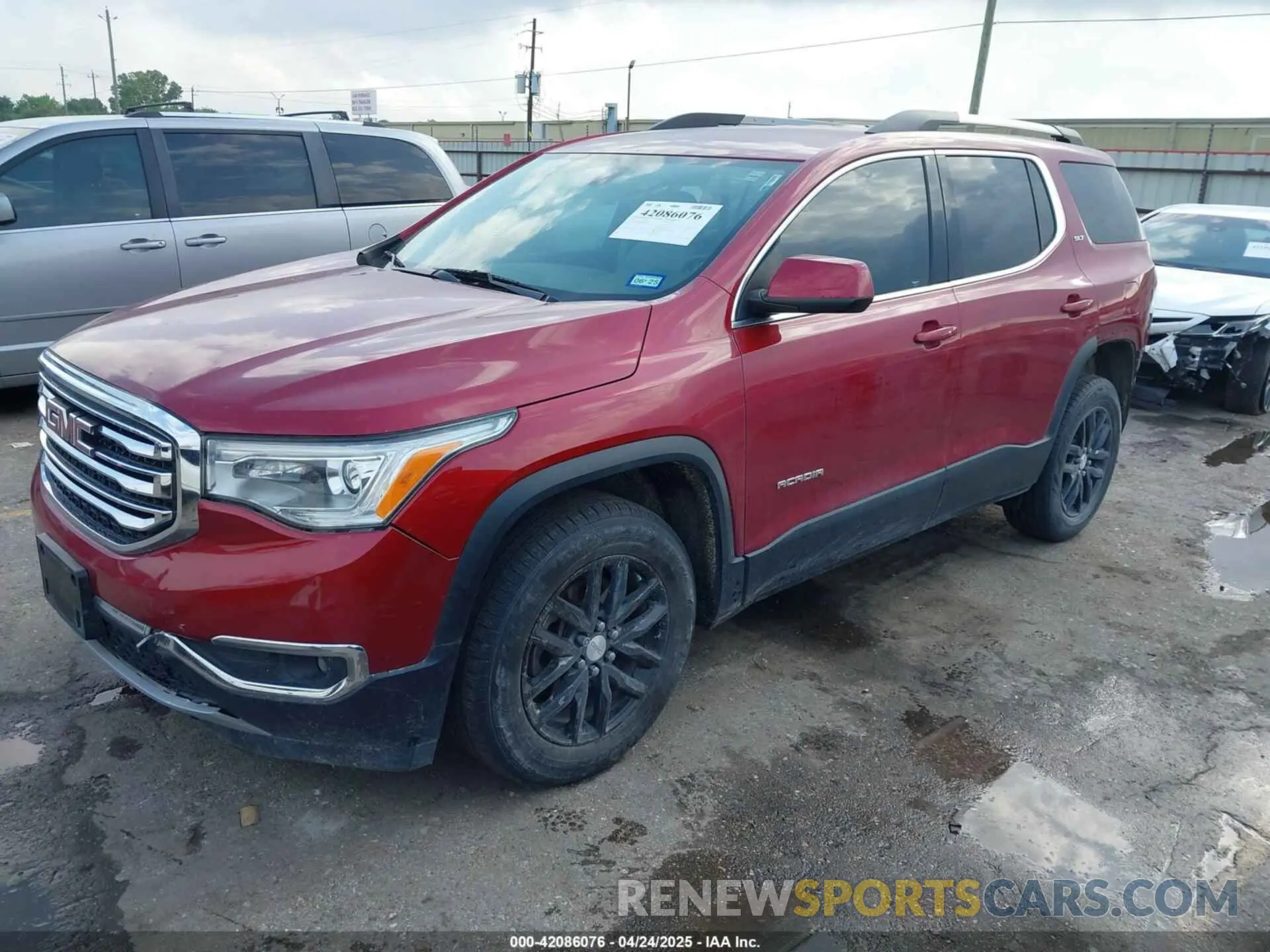 2 Photograph of a damaged car 1GKKNMLS3KZ130971 GMC ACADIA 2019