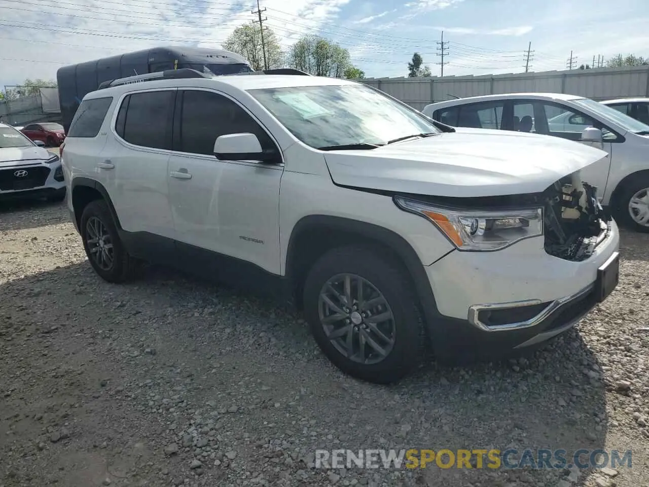 4 Photograph of a damaged car 1GKKNMLS9KZ164235 GMC ACADIA 2019