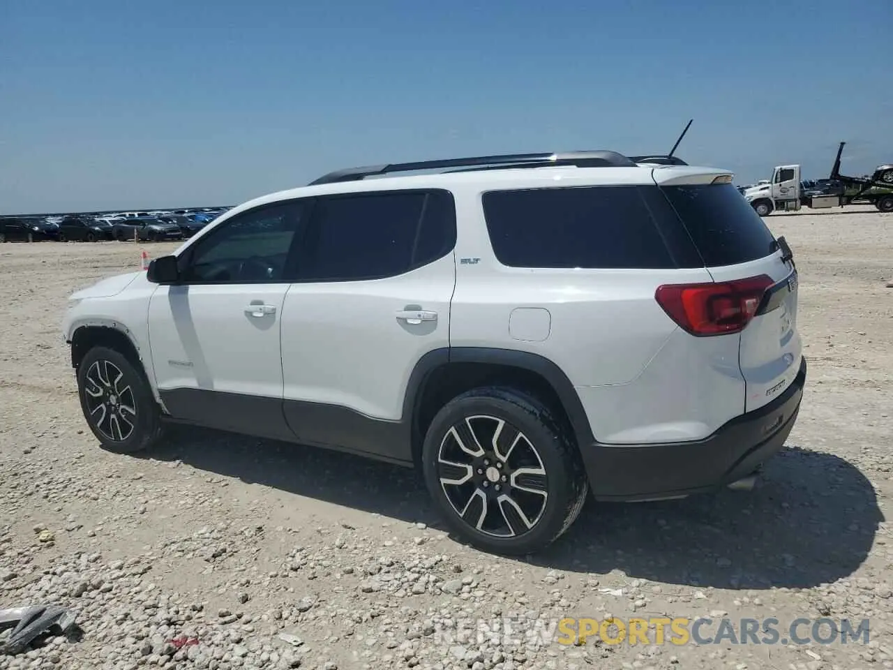 2 Photograph of a damaged car 1GKKNMLS9KZ190723 GMC ACADIA 2019