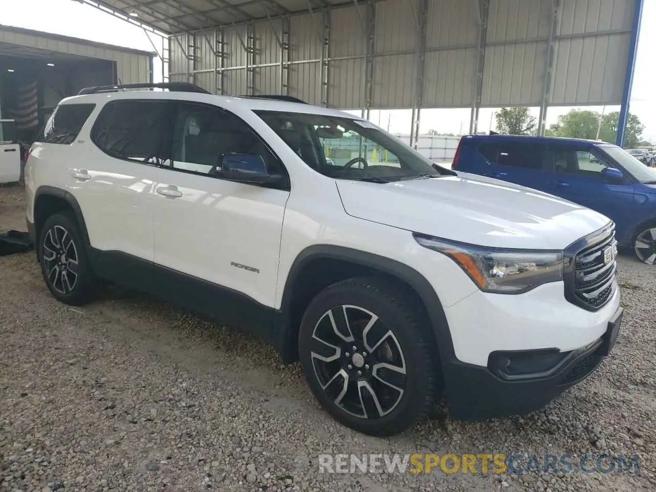 4 Photograph of a damaged car 1GKKNMLSXKZ293309 GMC ACADIA 2019