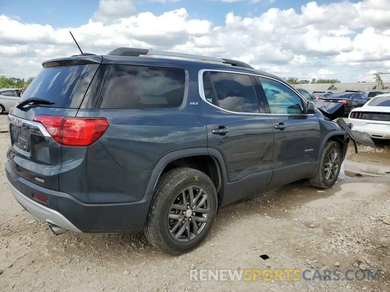 3 Photograph of a damaged car 1GKKNULS2KZ133716 GMC ACADIA 2019