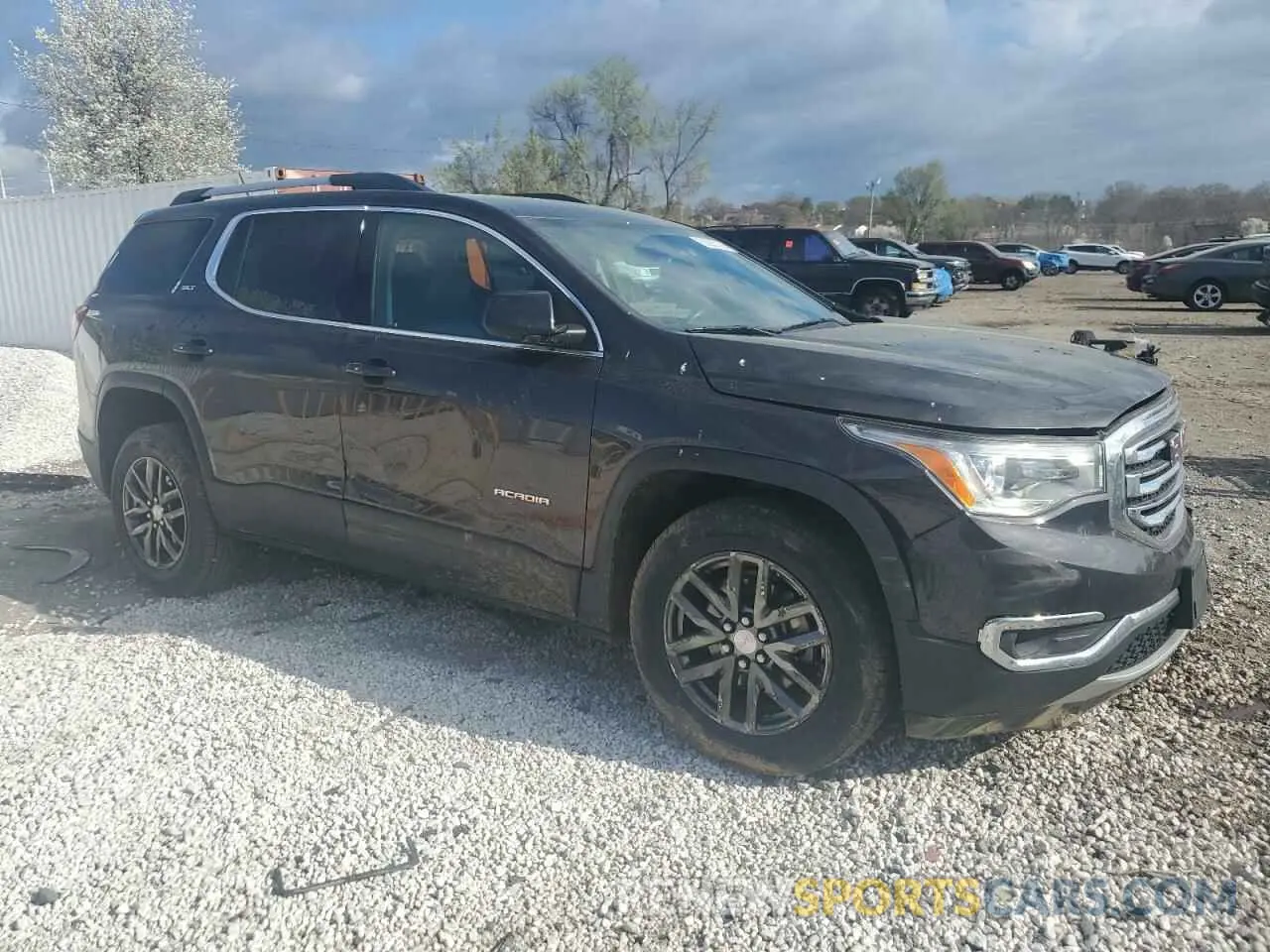 4 Photograph of a damaged car 1GKKNULS5KZ159193 GMC ACADIA 2019