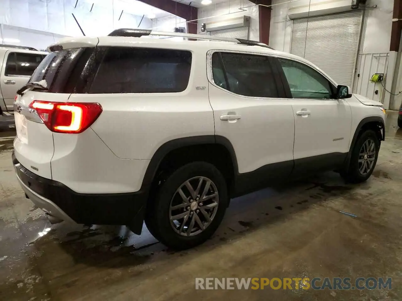 3 Photograph of a damaged car 1GKKNULS6KZ269279 GMC ACADIA 2019
