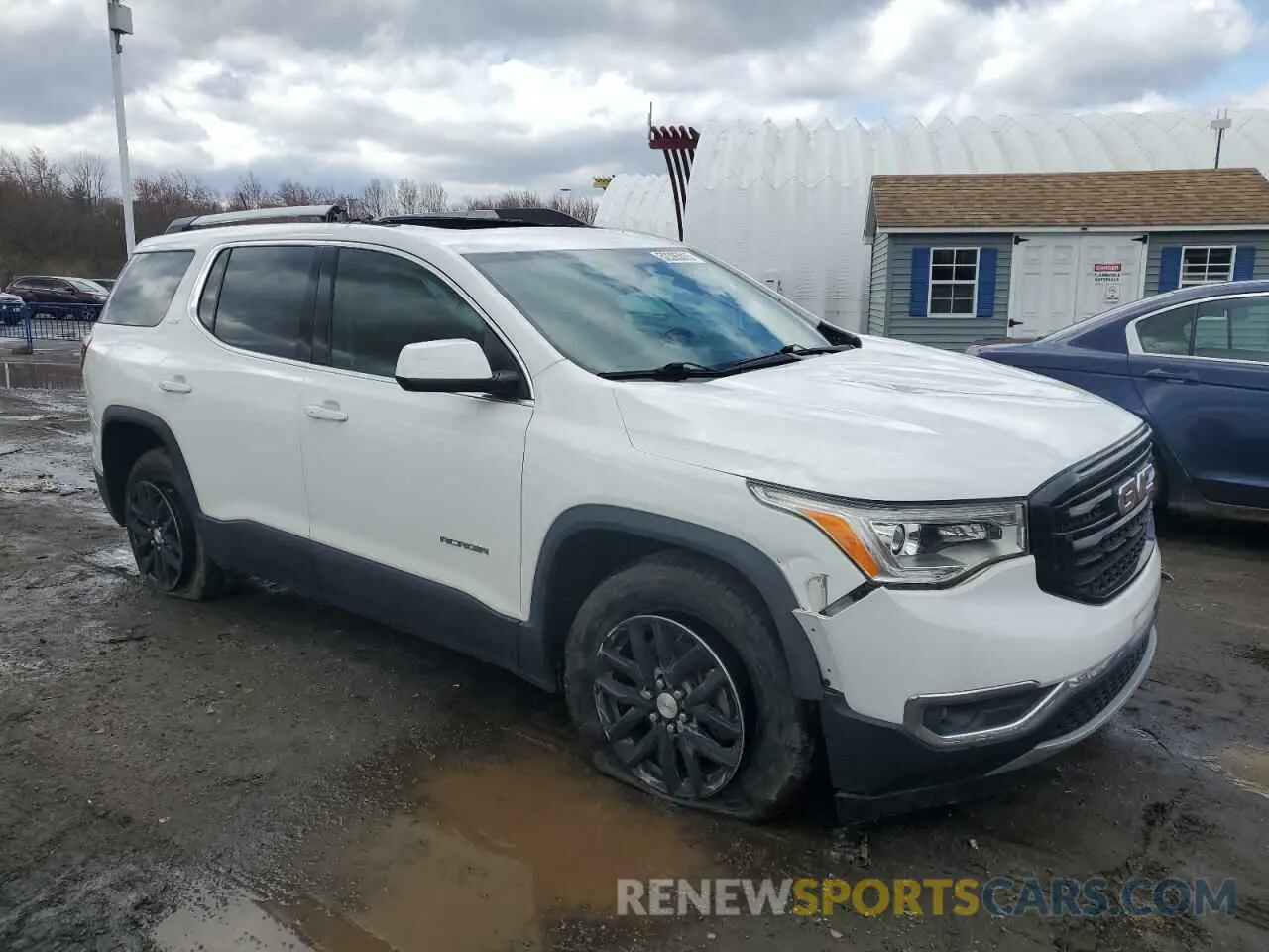 4 Photograph of a damaged car 1GKKNULS7KZ104499 GMC ACADIA 2019