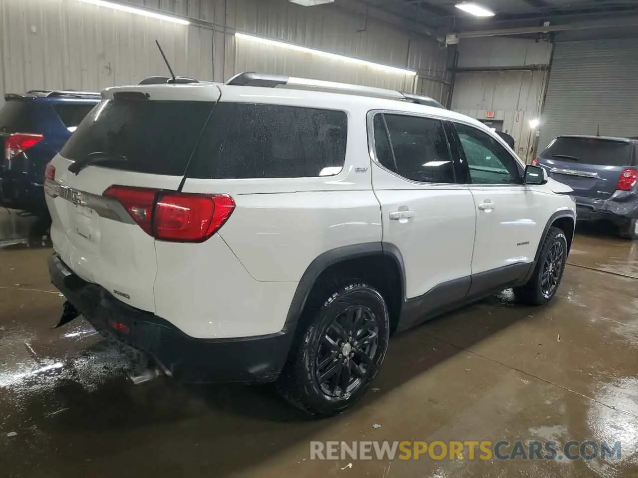 3 Photograph of a damaged car 1GKKNULS7KZ139172 GMC ACADIA 2019