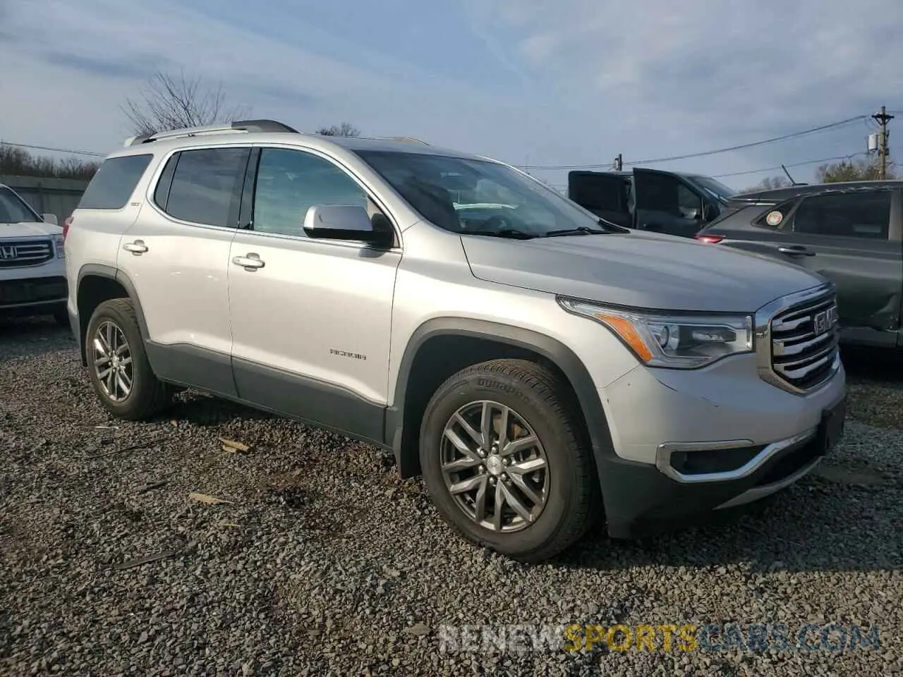 4 Photograph of a damaged car 1GKKNULS8KZ254055 GMC ACADIA 2019