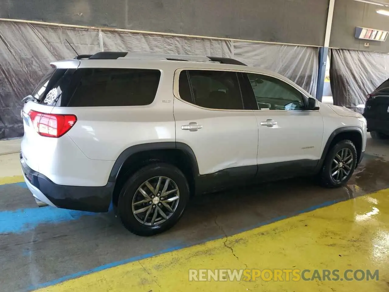 3 Photograph of a damaged car 1GKKNULS8KZ283264 GMC ACADIA 2019