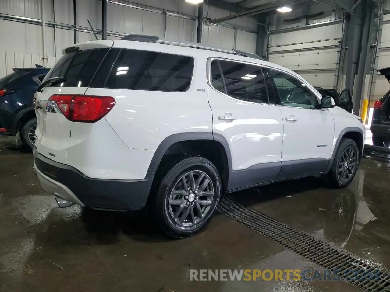3 Photograph of a damaged car 1GKKNULS9KZ235370 GMC ACADIA 2019