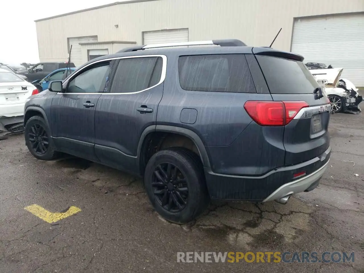 2 Photograph of a damaged car 1GKKNULSXKZ130692 GMC ACADIA 2019