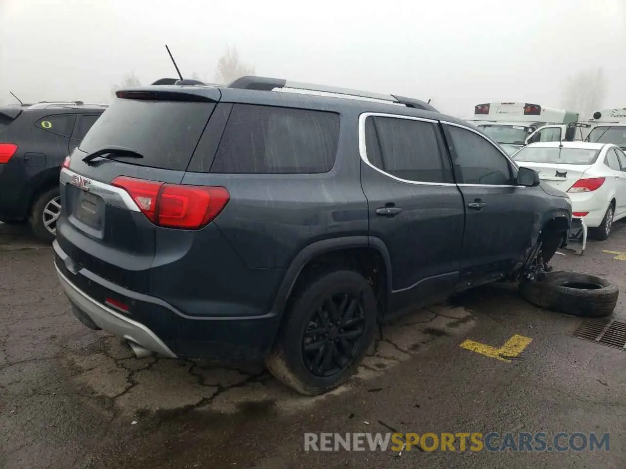 3 Photograph of a damaged car 1GKKNULSXKZ130692 GMC ACADIA 2019