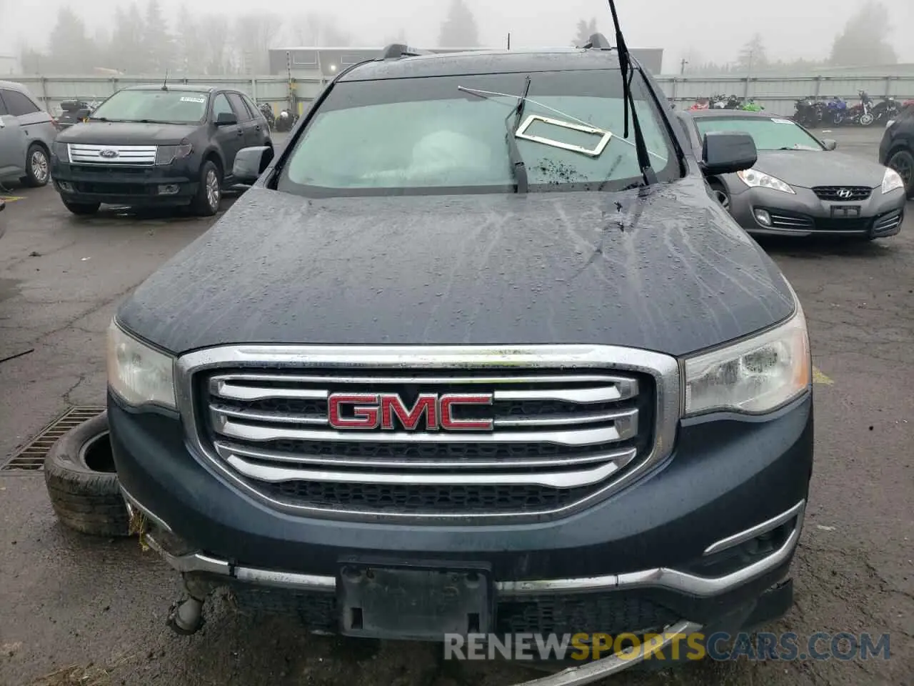 5 Photograph of a damaged car 1GKKNULSXKZ130692 GMC ACADIA 2019
