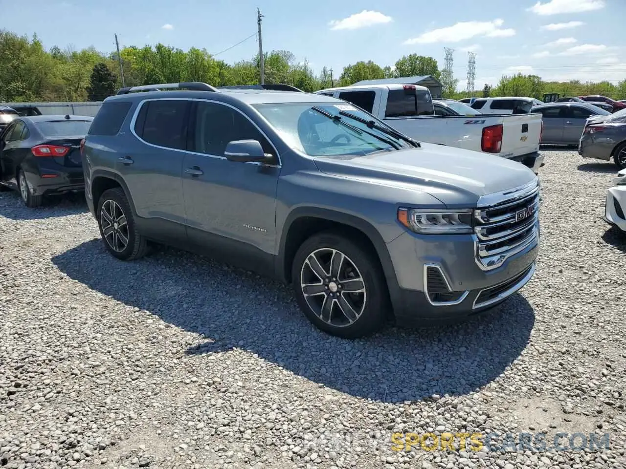 4 Photograph of a damaged car 1GKKNMLS7LZ130716 GMC ACADIA 2020
