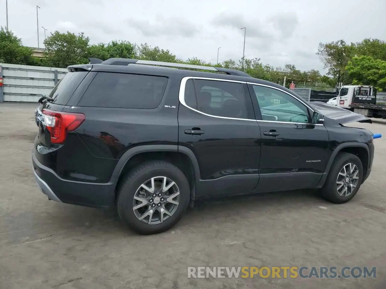 3 Photograph of a damaged car 1GKKNKLAXMZ153646 GMC ACADIA 2021