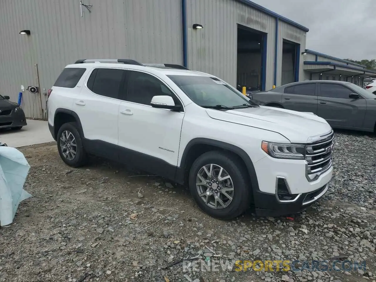 4 Photograph of a damaged car 1GKKNMLS1MZ234345 GMC ACADIA 2021