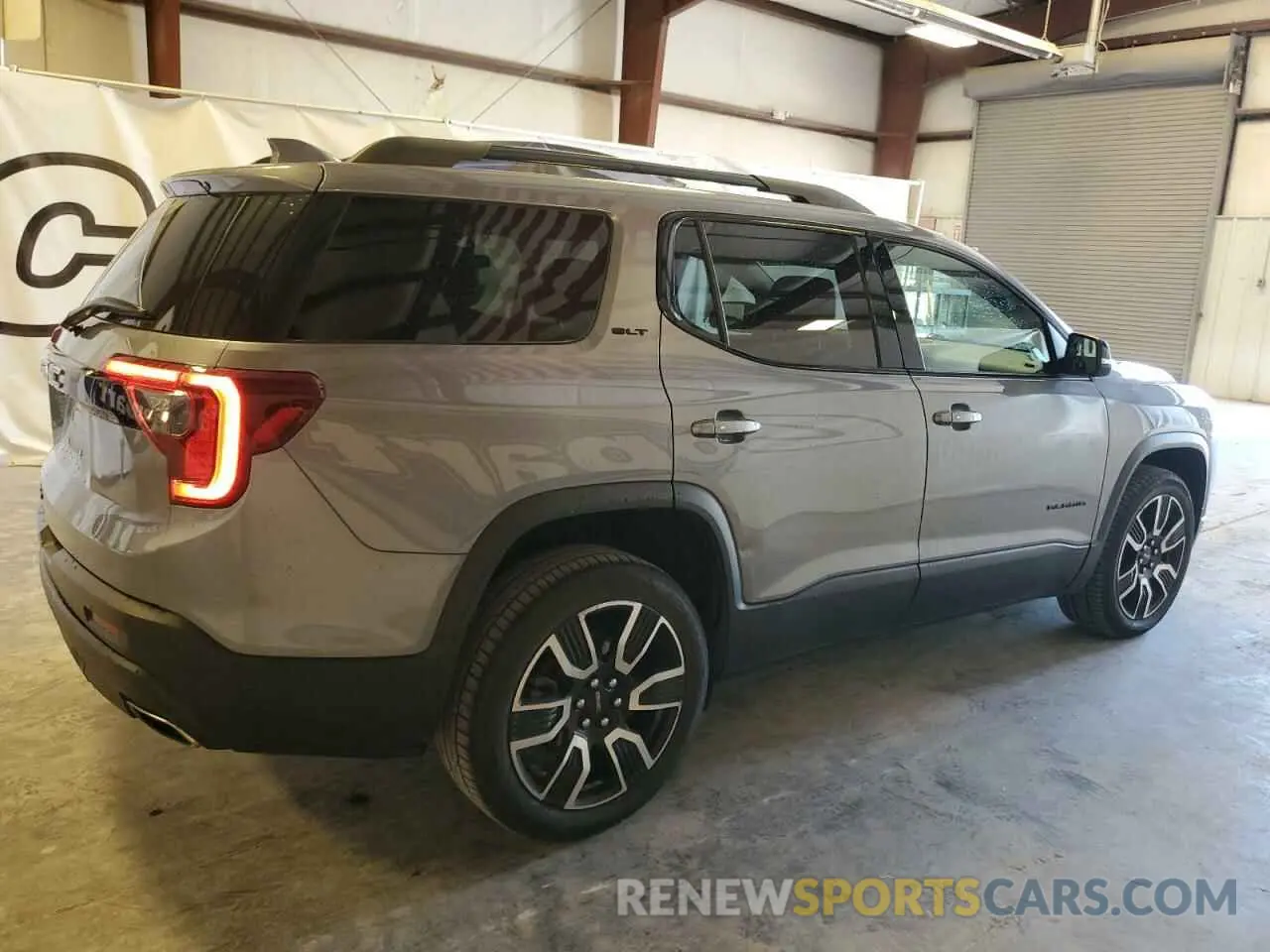 3 Photograph of a damaged car 1GKKNMLS4MZ161763 GMC ACADIA 2021