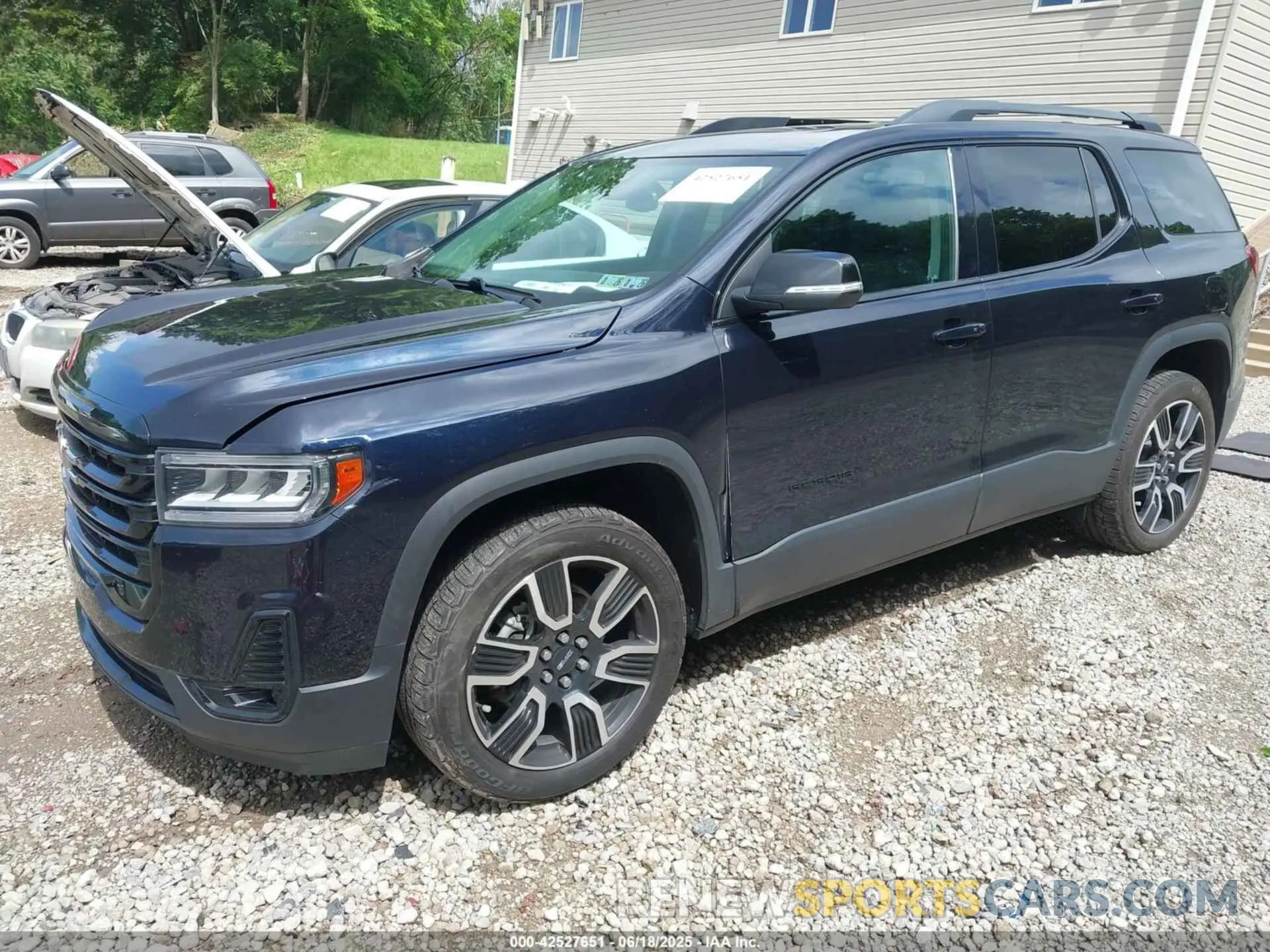 2 Photograph of a damaged car 1GKKNULS6MZ130725 GMC ACADIA 2021