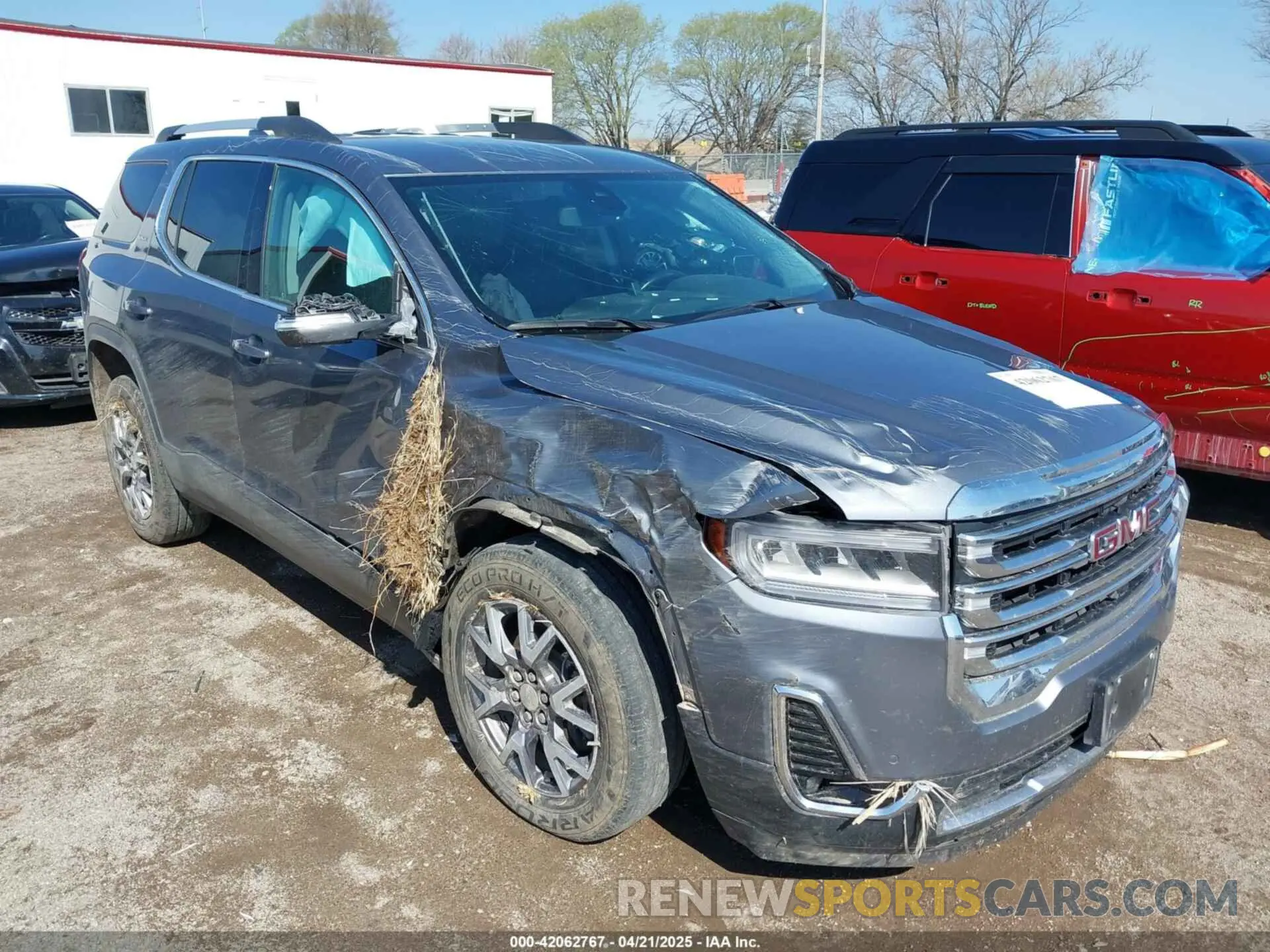 18 Photograph of a damaged car 1GKKNULSXMZ102801 GMC ACADIA 2021