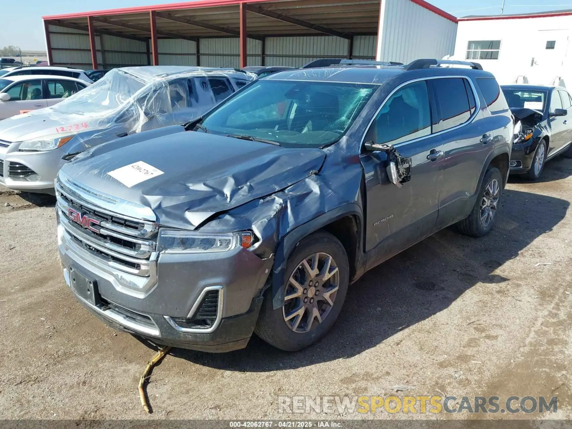 2 Photograph of a damaged car 1GKKNULSXMZ102801 GMC ACADIA 2021